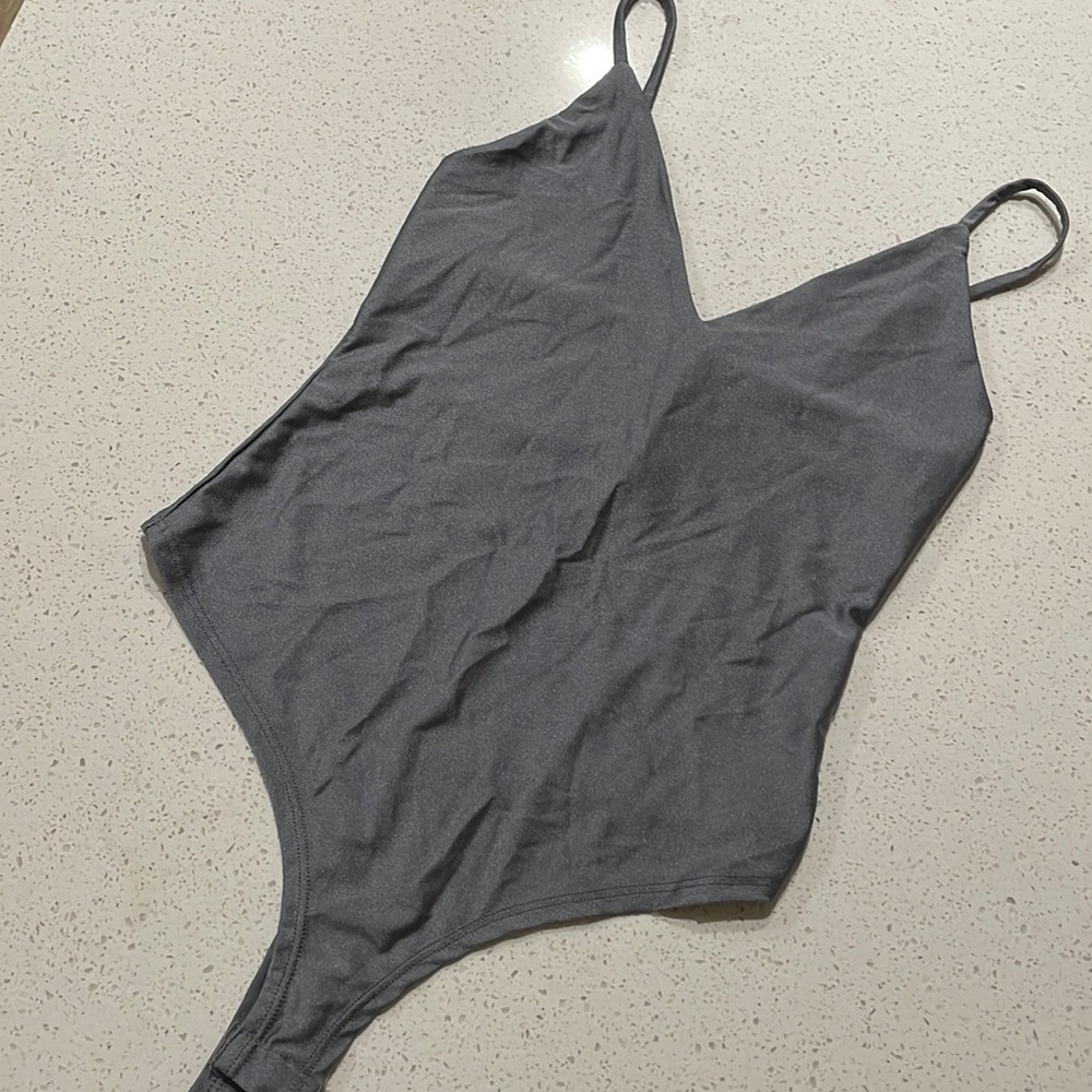 Shiny bodysuit, size small.